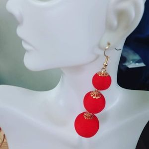 Handmade thread pom pom earrings, they are very light.